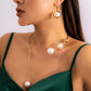 Earrings and Necklace with Pearls
