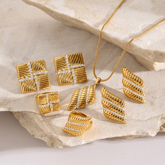 Gold Earrings Necklace and Rings in Marine Style