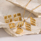 Gold Earrings Necklace and Rings in Marine Style